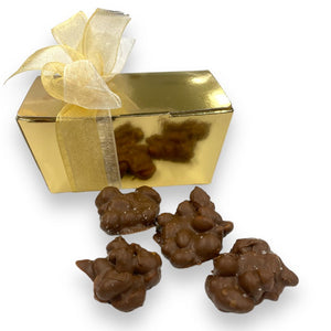 200 gram Pindarotsjes met zeezout in gouden doosje - Macaronstore.nl